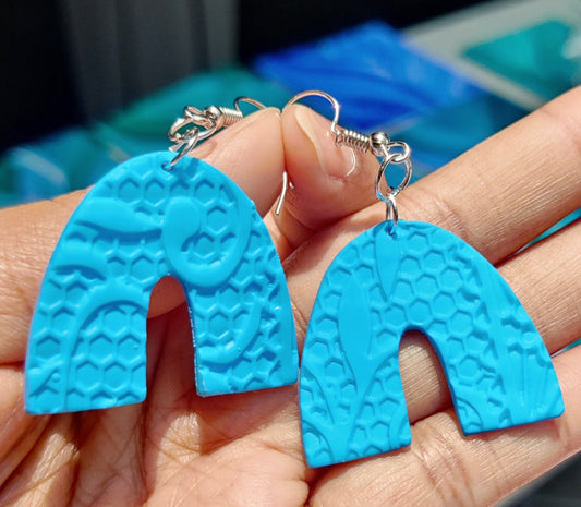Arch dangler earring